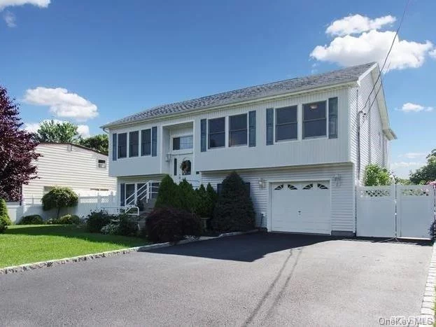 Beautiful 4Bdrm, 2.5 Bth Hi-Ranch In The West Islip Schools Builders Home-Built In 2001.Open Floor Plan With Deck Off Eik To Country Club Backyard With Free Form Pool/Waterfall;Custom Landscape; Gazebo;Koi Pond;Pvc Fenced Yard;Paver Patio. Bathrooms 2015.Extra Large Master Bdrm W/Wic:Laundry On Main Level;Extra Large Rec Room W/Entr To Yard-Great For Entertaining.A Must See