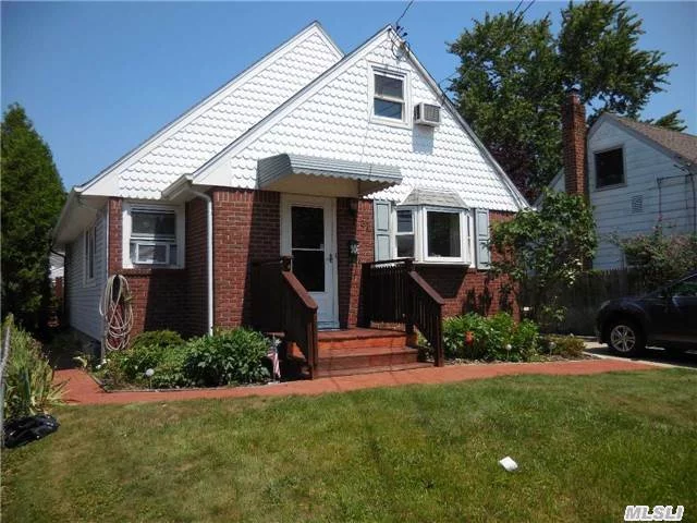 Charming Cape In Desired Plainedge School District. Wood Floors. Updated Roof, Siding, Windows. Full Basement With Wet Bar, Large Family Room And Possible 4th Bedrooms, Laundry Area With Slop Sink, Sep Hot Water Heater, 150Amp Electric. 1.5 Detached Garage With Extended Driveway. Fully Fenced Yard With Covered Patio/Deck.