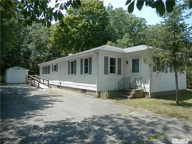 Your North Fork Year Round Getaway! Charming Floorplan With Lots Of Amenities And Just A Short Distance From Superb Deeded Bay Beach Picnic Area And Town Shops! Rear Deck Overlooking Woodland Preserve With Electric Shade Awning. Solidly Built Home! Great Place For The Family! Make Your Offer Today!