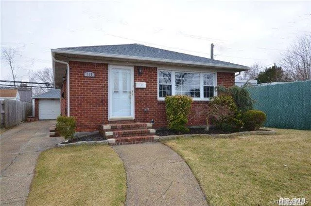 Updated Brick Ranch In School District #5! House Features 3 Bedrooms, 2 Full Baths, Full Finished Basement, 1.5 Detached Garage, Updated Roof, 200 Amp Electric! Walking Distance To Lirr! Close To All Shopping & Major Highways! Gas Line W/In 100 Feet From Home. Convenient Location! Make This Your New Home!