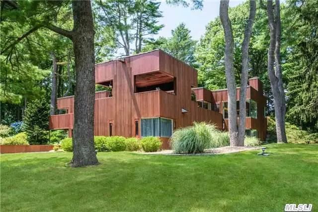 Serenity Prevails At This Timeless Cedar Contemporary Designed By Former Colleague Of I.M. Pei; Large Light-Filled Rms Are Enveloped By Walls Of Glass Offering Sweeping Vistas Of The Pastoral 8.5 Acre Landscape; Gunite Pool, Har-Tru Tennis Court, Multiple Cedar Decks & Unique Outdoor Lr; Latt. Beach & Golf Priv (Fee);