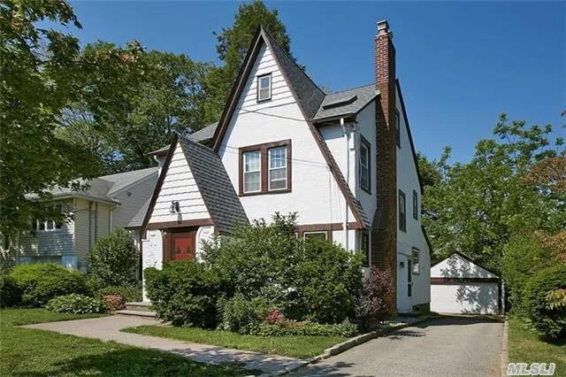 Fully Renovated Four Bedroom Tudor On A Lovely Quiet Street In The Heart Of Great Neck Village. Living Room With Fireplace, Family Room, Formal Dining Room And A New Granite Counter Top Eat-In-Kitchen Leading To Deck Overlooking Private Backyard. Hardwood Floors, A Full Basement & Two Car Garage.Brand New Heating, Baker Hill Elementary, North Middle And High Schools.