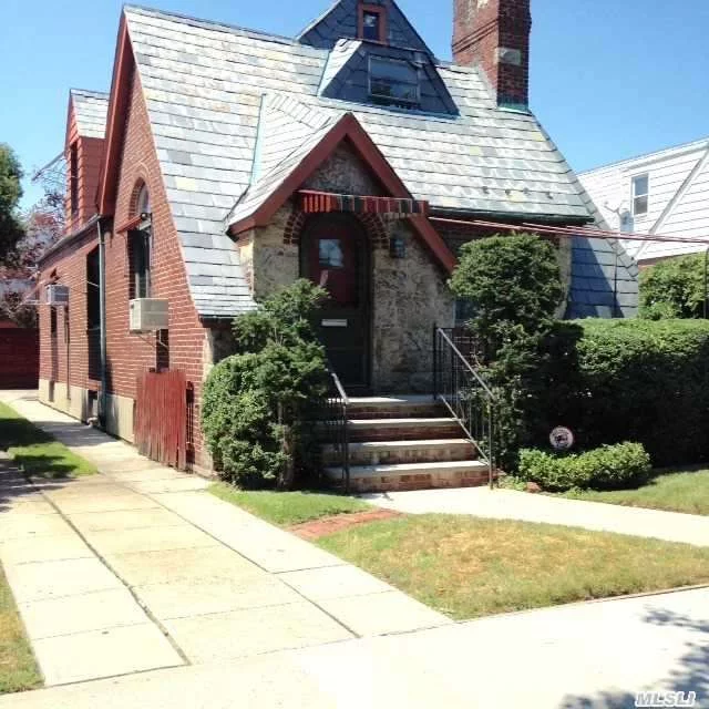 Charming Brick Cape With Old World Charm. Large Fdr/Lr W Fpl/Arched Doorways. Eik/ Fabulous Top Floor. Very High Ceilings . Office In Basement . Sep Entrance Beautiful Yard. District 26.