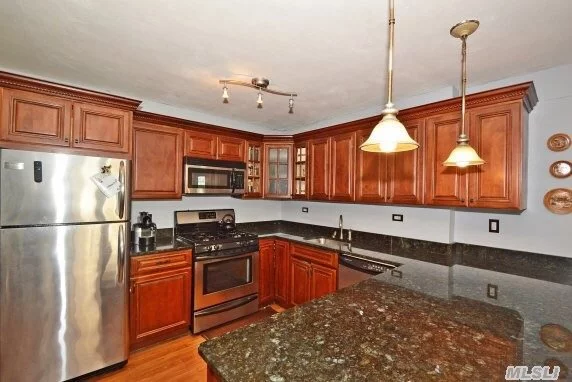 Resort-Style Living On Little Neck Bay, Large One Bedroom, Big Open Eat-Kitchen, Granite Island & Counter Tops, Stainless Steel Appliances, Great For Entertaining, Large Living/Dining Room, Renovated Bath, Terrace, Reserved Indoor Parking, Pool, Tennis, Gym, 24Hr Doorman, Stores, 30 Mins From City By Lirr Or Express Bus