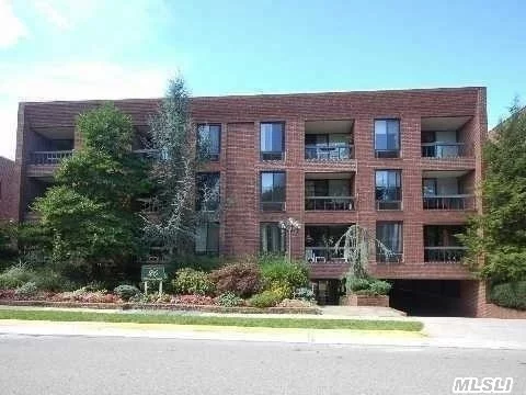 E/H, Huge L Shaped Lr/Dr W/Magnificent Custom Built Cabinets. Lr Leads To A Lovely Terrace. 2 Large Bedrooms & Renovated Baths W/Both Tub & Shower Stalls. Mbd Suite Leads To A Second Private Terrace & Walk In Closet. W/D In Unit, Apartment Has One Covered Parking Spot & Storage. Emb Elem. School And Optional South/North Middle/High Schools. Near Worship, Lirr, Town, Park