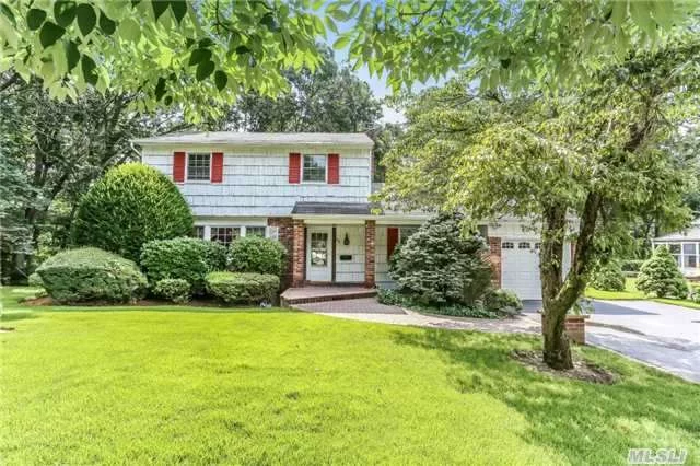 Lovely Colonial On Semi-Private Street, Adjacent To Old Bethpage Village Restoration. This Home Has Great Curb Appeal. Interior Boasts Large Rooms, Wood Floors Protected By Carpeting, Eik, Gas Cooking, Sunken Den With Fireplace, Updated Electric, Cac, Igs And Alarm. A Must See!!