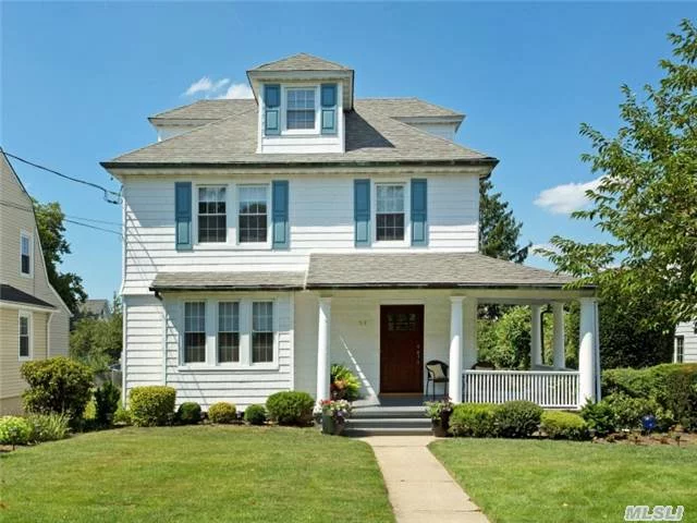 Impeccably Updated Circa 1918 Front Porch Colonial-Style Home Set On A Deep Lot Of 50 X 150. This Wonderful Home Boasts Architectural Details From Its High Ceilings To Its Sun-Filled Living Room And Dining Room With Fireplace. Updated Eat-In Kitchen, New Heating System, New Central Air Conditioning Newly Refinished Hardwood Floors New Hall Bath, And 2nd Floor Laundry.