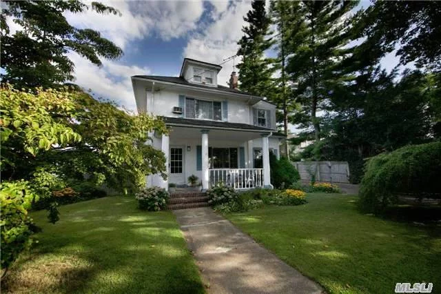 Classic Side Hall Colonial With High Ceilings, Well-Kept, Hardwood Floors, Spacious Front Porch, Back Porch And Rear Patio, Oversized Driveway To Accomodate Multiple Cars With Turn Around Space, 2 Car Detached Garage, 7 Year Old Boiler, Large Yard, Deep Property, Low Taxes, Close To Lirr And Houses Of Worship.