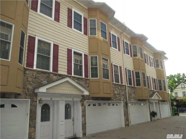 *Taxes Reflect Grievance Of $2, 294 Won For 2017.* 7 Yr Young Gorgeous Townhouse. 2 Bdrms, 2 Bthrms, 2 Car Gar, 4th Lvl W/ Laundry Rm & Office. Custom Kit W/ Granite Ctops & Ss Appliances. Dark Oak Flrs Throughout Main Lvl Open Floor Plan. Comes With The Upgraded Light Fixtures & High-End Window Treatments That Are Currently In The Unit!