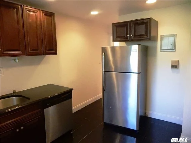 All Renovated 2 Bedroom W/ 1 Marble Bath, Living Room/ Dining Room Combo, Eat-In-Kitchen With Stainless Appliances. Laundry & Storage In Basement.Indoor Parking Avail For $150/Monthly . Heat & Water Included. Walk To Shops, Parks & Buses.