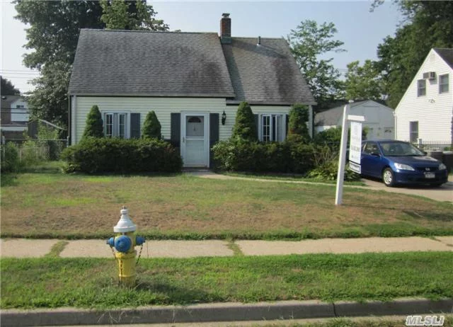 Just Move Into This Adorable Cape Cod ! Newer Windows, Roof, Siding, Exterior Doors, 200 Amp Electric, In-Ground Sprinklers, Oak Kitchen Cabinets With New Stove, Laminate Flooring, Brick Patio & More ! If You&rsquo;re Just Starting Out Or Downsizing This Could Be What You&rsquo;re Looking For !