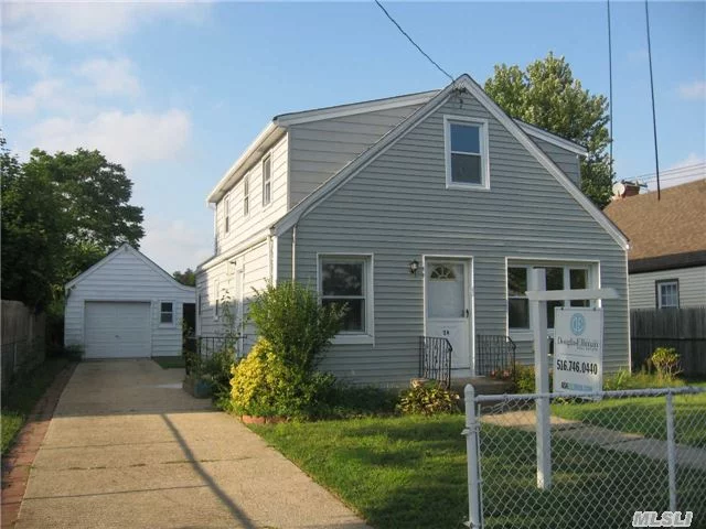 Fully Renovated Dormered Cape. All New Roof, 3 Baths & Kitchen With Ss Appliances. Hi Hats In Lr. Wood Floors Throughout. Finished Basement. Priced To Sell Fast.