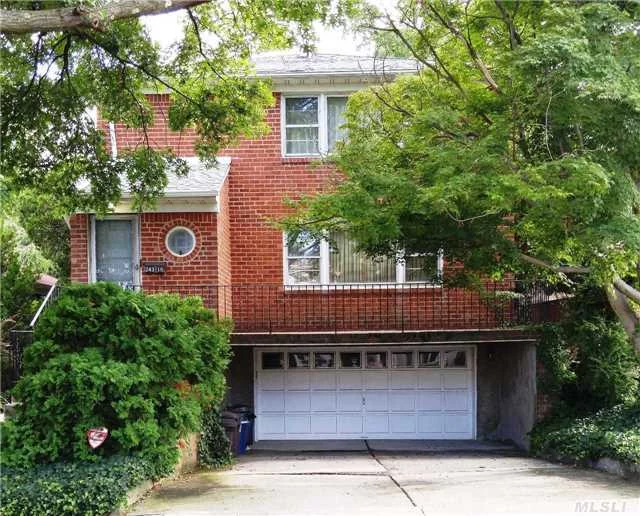 Meticulously Maintained Two-Family All-Brick House In Great Condition. Ideal For Either Mother/Daughter Or Separate Rentals. Both Spacious Units Are Over 1, 400 Square Feet. Hardwood Floors Throughout. 2 Separate Heating Zones. Huge Lovely Back Yard W/Custom Stone Patio. Full Above-Grade Basement With Walkout Entrance. Located On A Quiet Street With No Through Traffic.