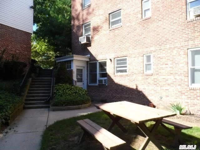 This Is The Tucked-Away, Quiet, First-Floor Corner Unit You&rsquo;ve Been Waiting For! Hgtv Updated Incl A Separate Entrance And Private Outdoor Green Space/Patio Area For Entertaining. Beach & Golf Rights. Add&rsquo;l Parking Spot Available For $25 Month. 1 Minute Walk To Lirr. Laundry, Gym, Storage & Car Wash On Premises. Buyer Is Subject To Co-Op Board Approval & Requires 20% Down.