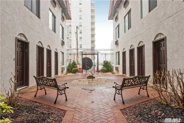 Absolutely Mint 1 Bedroom Condo Duplex. Features: Oversized Living Room And Dining Area, Updated Kitchen With New Granite Counter Tops & Ss Appliances, Updated Baths, Beautiful Hardwood Flooring Throughout, , Laundry Room In Unit, Master Bedroom With Private Full Bath, 1/2 Bath On Main Fl, Freshly Painted, Small Storage Unit, Parking Spot & Across From The Beach & Boardwalk!