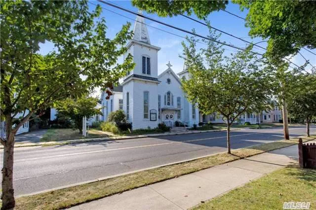 Price Includes Incredible Well Kept 6700 Square Foot House Of Worship. Plus 2200Sq 4 Bedroom 1.5 Bath Parsonage With Onsite Parking. This Beautiful Building Has Potential For Many Creative Ideas, Is Centrally Located The Heart Of Greenport. Itself Has A Magnificent Sanctuary With Working Organ & Balcony Area. The Parsonage Is In Excellent Condition, Possible Subdivion