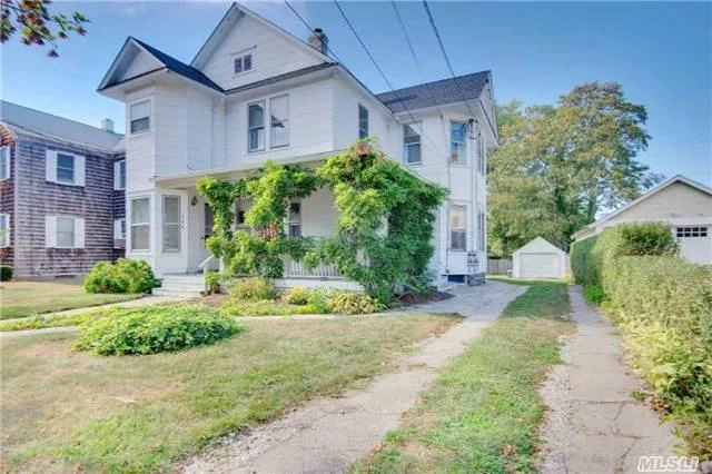 Rarely Available Turn Of The Century Greenport Village Home. Legal 2 Family Can Easily Be Combined To One. Located On A Quiet Street Of Sea Captains Homes. It Is Walking Distance To Shops, Restaurants, Jitney & Train. Loaded With Charming Details. Wrap-Around Porch. Partial Views Of The Harbor On The Second Floor. Gorgeous Wood Floors. Private Yard. Garage.