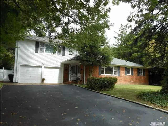Rare Opportunity To Own Legal 2 Family Home In The Heart Of N. Syosset. Fantastic Rental Income Possibilities. Walk To Train, Town, Restaurants Etc. Located On Quiet Dead End Street Adjacent To Country Club W/ Private, Large Fenced Yard. Bright And Sunny With Gleaming Hardwood Floors. Move Right In! Many Updates! Syosset Schools!