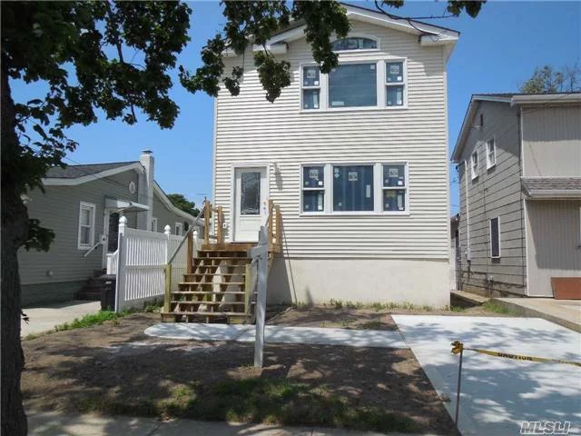 New Construction! House Is Built! Spacious 1800 Sqft Colonial W/3 Bedrooms, 2.5 Baths Eik, W/Ss Appliances, And Granite, Laundry Room, Master Bedroom Suite W/ Full Bath And Walk-In-Closet, Wood Floors Cac, Quality Construction Built To Fema Code, Private Beach, Close To Lirr, Worship, And Stores.