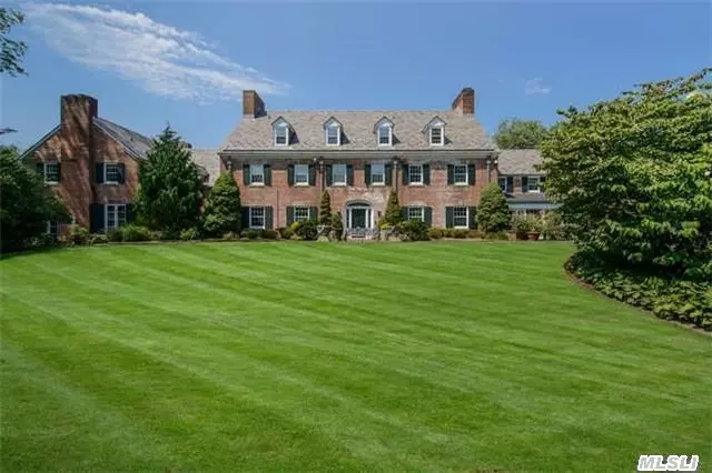 A Gentleman&rsquo;s Estate On 9-Acres, Wrought Iron Gates Leading To Brick Manor With Slate Roof And Equestrian Center, Set Around Cobblestone Courtyard. Large Entertaining Rooms, 10 Fireplaces And More.Paddocks And Box Stalls, Run-In Shed, Tennis Court, Pool & Pool House. 2 Guest Residences. Brick Patio, Terrace.