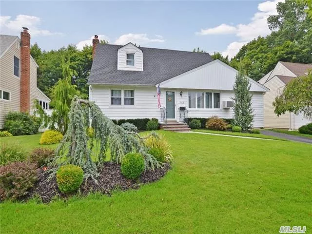 Beautifully Renovated 4 Bed, 2 Bath Cape In Desirable Radcliff Manor. Kitchen W/ New S/S Apps, Gleaming Hardwood Floors, Brand New Paint/Doors/Moldings Upstairs, New Front Roof & Windows. Encl Sunroom Leads To Large Private Fenced-In Property. Full Basement W/Huge Storage Area & Finished Playroom. Wave Air Filtration System. Very Low Taxes! Perfect Mid Block Location!