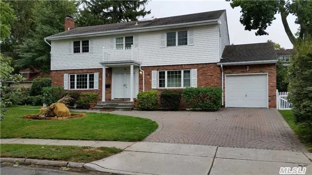 Bright & Immaculate 4 Bedroom 2.5 Bath Center Hall Colonial. Eat In Kitchen With New Kitchen Cabinets, Updated Baths. Large Master Suite With 2 Walkin Closets. Ez Commute Floors Just Refinished, Freshly Painted