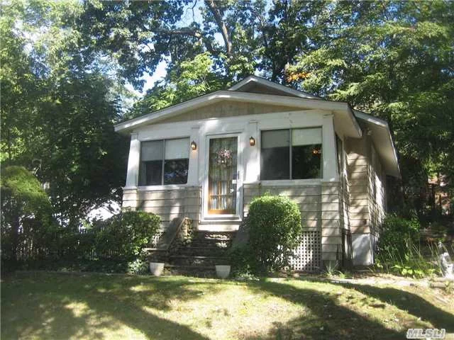 Absolutely Adorable 1 Bedroom Cottage On Amazing Property. Needs Tlc Being .Sold As Is(Roof On House Is Old But Not Leaking & Orig.Windows W/ Storms Added In 84)Hi Ceilings, Character & Charm Galore Make This A Special & Unique Property. Expand, Teardown Or Live In It While Building New.Many Possibilities.All Gas.200 Amps.Wood Flrs.Just Up Road From Hempstead Harbor.