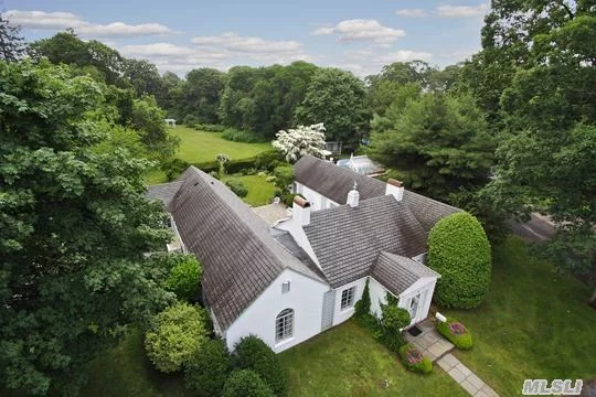 Amazing Classic Home With Two Wings Surrounded By English Garden Courtyard. Gorgeous Private Property, Large Formal Living Room W/Fp, Large Formal Dining Room, Large Bedrooms W/En-Suite Baths. Private Free Form Gunite Pool W/Pool House. A Chance For You To Own One Of The Great Homes Of The South Shore!