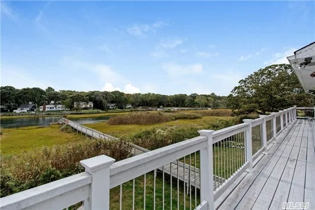 Waterfront Home On Corey Creek With New Dock And 3Ft Of Water At Low Tide. House Has Great Views Of Peconic Bay From Home And Wrap Around Deck. 3 Large Bedrooms W/ 3 Baths. Open Floor Plan With Updated Kitchen And Baths, Hardwood Floors, Wood Burning Fireplace, And Cac. Perfect Year Round And Summer Home.