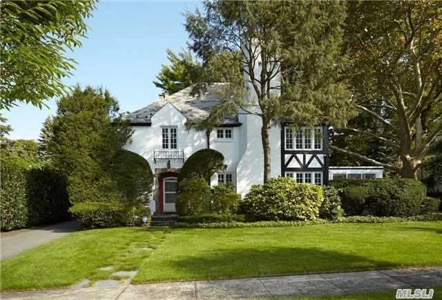 Tudor Classic - Distinguished English Tudor On Large Park-Like Grounds On Quiet Interior Street Of Prestigious University Gardens. This Sunny, Spacious Gem With Charming Architectural Details Has 5 Brs, 3.5 Baths, Hardwood Floors, New Windows, Updated Eik, Formal Lr, Dr, Large Den And Florida Room.