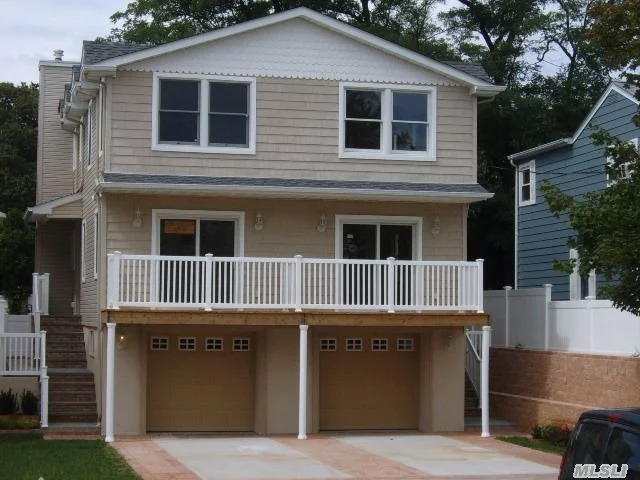 A Young And Modern Side By Side Legal Two Family Built 2008 , Each Unit Has Two Big Master Bedrooms 20&rsquo;X12&rsquo; & 19&rsquo;X12&rsquo;, With High Cathedral Ceiling , Modern Eat In Kitchen , Two Car Garage And Finished Basement.