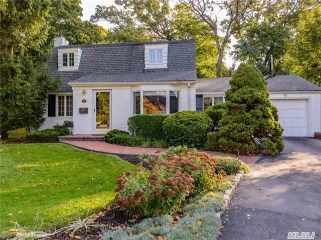 Wonderful Strathmore Colonial With Expanded Entry Foyer, Expanded And Newly Decorated Dining Room, Expanded And Renovated Kitchen, Den With Vaulted Ceiling Plus A Spacious Screened Sunroom. All New Windows, Architectural Roof, French Doors, Expanded Wood Deck And Renovated Bathrooms. Must See House To Appreciate All The Wonderful Features, Won&rsquo;t Last!