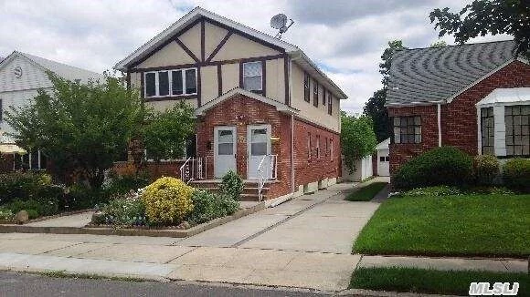 Yr 2005 New Alteration 2 Fam/Newly Changed Elecric Wire, 2 Seperate Electricity/Cac And Central Heat System, Brck-Stucco Tudor Style, Near Lirr, Q12/Q28/Q30/Q16-76, Hard-Wood Floors, Granite Counter-Tops, Newer Driveway, Front Patio And Back Cement Patio, Sd26(Ps159, Is25, Bayside High), Great Income Property.House Will Deliver Vacant Title