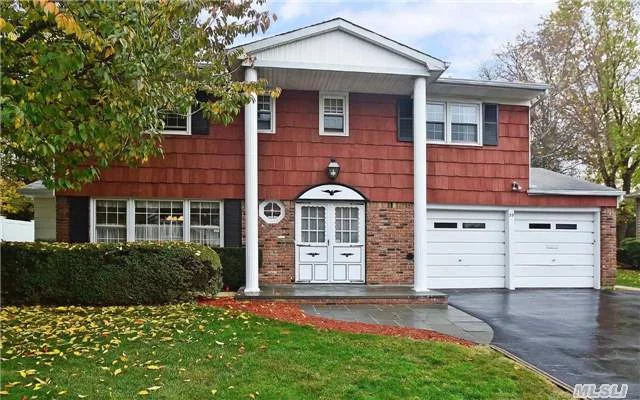 This Colonial Splanch In Desirable Seton Hills Of Old Bethpage Located On Park Like Professional Landscaped Property In Perfect Mid-Block Loc, Features:4 Lrg Brs On One Level, Updt Eik, Ugs, Brk Fpl, Hardwd Floors, Replacement Windows, Multi-Car Drvwy. Great Street, Great House With Unlimited Potential!