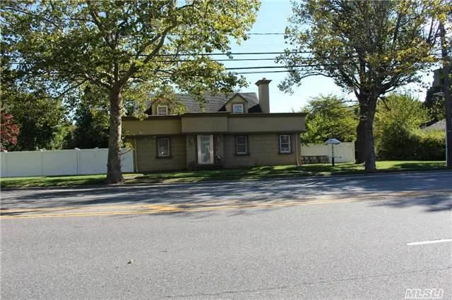 15, 000 Sq Ft +/- Commercial Zoned Property ( G B, General Business, Town Of Oyster Bay )With 160 Feet Frontage On Woodbury Rd!!! 94 Feet Deep!!! Great Potential, Excellent Corner Exposure, Many Possible Uses. Full Basement. Has Apartment On 2nd Floor & 2 Car Detached Garage. Plenty Of Room For Parking. Re Taxes Are Being Grieved.