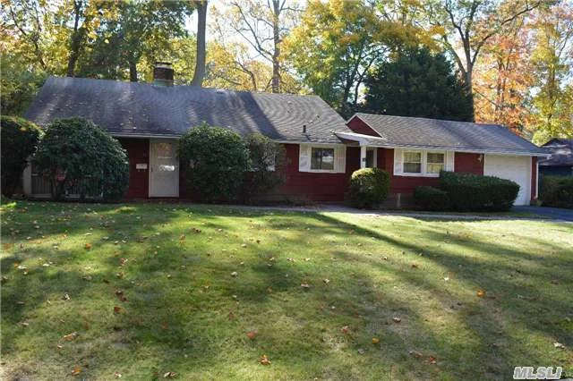 A 3 Bedroom Ranch With 1.5 Baths, Living Room With Fireplace, Kitchen, Dining Area, Den, 1 Car Garage, Tree Lined Property.