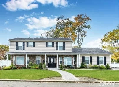 Gorgeous Renovated Colonial Featuring 4 Bedrooms & 2 1/2 Baths, Eat-In Kitchen W/ Island, S.S. App. And Granite, Wood Floors Thru-Out, Crown Moldings, Cac, Gas Heating, Paver Walkways And Patio, Large Fenced In Yard Prof Landscaped W/Igs. All Large Rooms, Family Room With Fpl. Gut Renovation Inside And Out Done In 2013. Flood Ins. $430. A Year