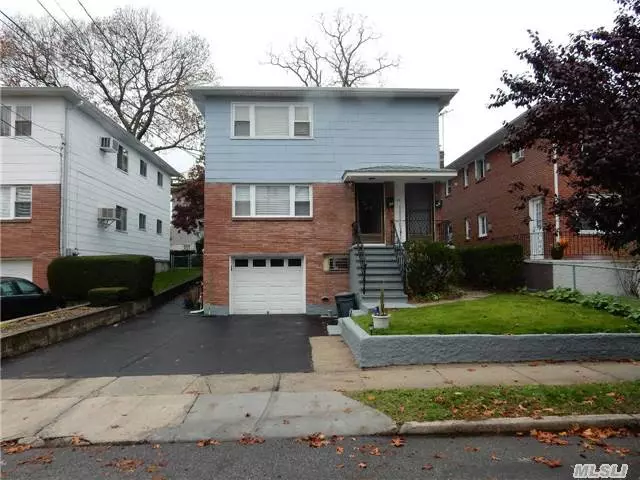 2 Family Home Each Floor Has 3 Spacious Bedrooms And 1 Bath, Eat-In Kitchens, Living Room/Dining Room. Full Basement W/Laundry. Attached 1 Car Garage. 2 Separate Heating Systems: First Floor And Basement Have Oil And The Second Floor Has Gas