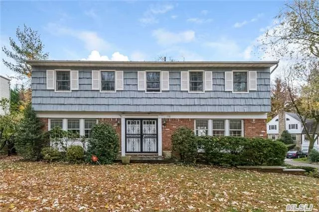 Spacious Center Hall Colonial In The South Strathmore Section Of Manhasset. Large Family Room With Fireplace, Living Room, Dining Room Eat In Kitchen.Powder Room. Large Master Suite/Bath , 3 Bedrooms With Hall Bath . 2 Car Garage Thru Basement Access. Munsey Park Elementary. Close To Trains, Village, Shopping, Golf, Parks