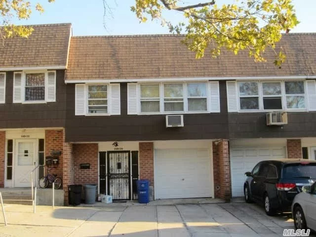 Douglaston, Large, Legal Two Family, 3 Bedroom, 2 Full Bath Apartment Over Large One Bedroom Apartment, Private Driveway With Parking For 5 Cars, One Car Garage, Full Finished Basement, Nice Fenced In Yard, Large Balcony Overlooking Yard, 3 Zones Heating, 3 Electric Meters, 2 Gas Meters.