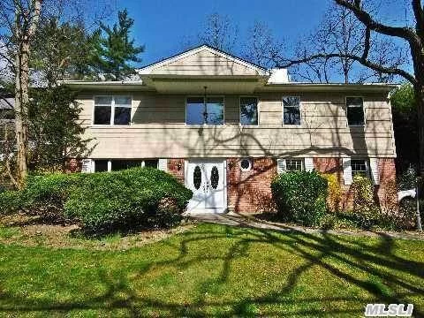 Pretigious Roslyn Estates Colonial With 4/5 Bedrooms 3.5 Baths In Roslyn School. Open Layout With Hardwood Floors Throughout. Fabulous Deck With Hot Tub In Backyard.