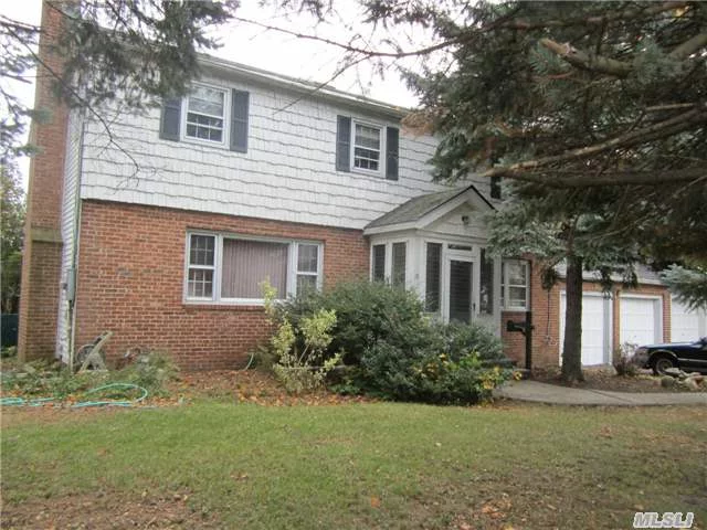 Amazing Renovation Opportunity; One Of A Kind 5 Bed, 3 Car Brick Garage Mid Block Colonial.........Possible Legal Mother Daughter With Proper Permits. Over Sized Lot With Swimming Pool(As Is). Convenient To All, Minutes To Lie, Lirr And Stores.