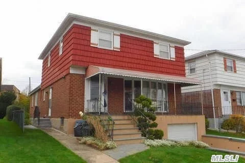 Beautiful One Family Home For Sale In Bayside. Includes Living Room, Dining Room, Eat-In-Kitchen, 5 Bedrooms, 3 Baths, Large Great Room + Full Finished Basement W/ Separate Entrance. Wood Flooring Throughout. Also Includes Spacious Backyard! A Must See!