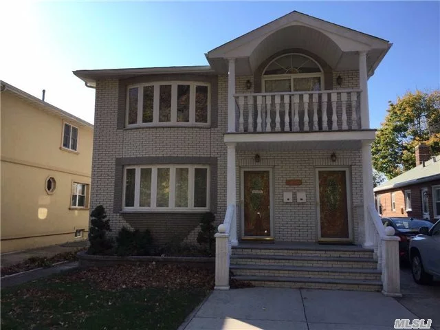 Gorgeous 2 Family Colonial Brick House In Oakland Gardens. Built In 2008, Featuring 4 Bedrooms, 2 Masterooms, 4.5 Baths & Private Terrace. Fully Finished Basement With Family Room & Storage. Convenience To L.I.E. 495.