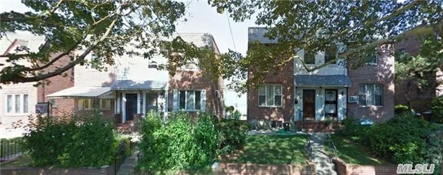 Solid Brick Semi-Detached Two Family, Renovated New Kitchen, Well-Maintained With Many Upgrades.