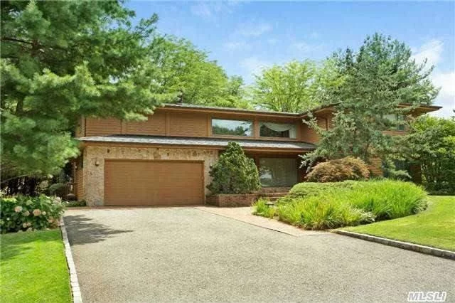 Large 5 Bedroom, 3 Bathroom Located In Saddle Rock. Home Was Totally Rebuilt In 1988. This Home Features Eat-In-Kitchen, Formal Dining Room, Den, Hardwood Floors, Central Vacuum, Maids Room And Full Finished Lower Level. Master Bedroom Features Jacuzzi W/ Steam Room And 2 Spacious Large Closets.