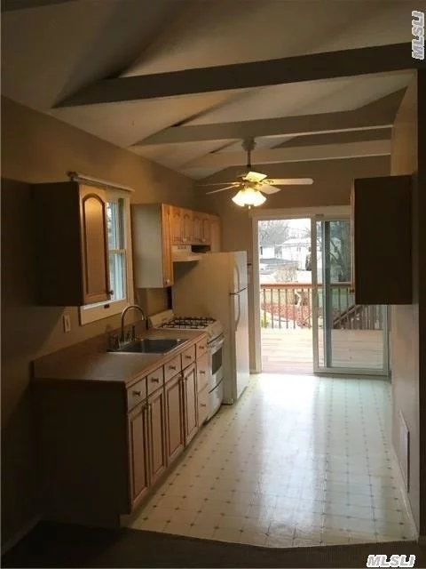 Beautiful 2 Bedroom Second Floor Apartment With Separate Entrance, All Utilities Included, Use Of Private Wood Deck And Storage Shed, Lovely Spacious Apartment With Eat In Kitchen And High Ceilings, Gas Cooking, Central Air Conditioning, Off Street Parking- Park In Driveway, Private Entrance,