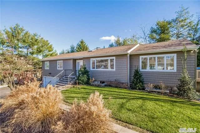 Recently Updated And Expanded To Perfection With New Siding, Roof, Baths, & Gourmet Kitchen. Sparkling Hardwood Floors, Sonos Sound System, Super Light And Bright. Outdoor Hot Tub Included. Non Flood Zone.