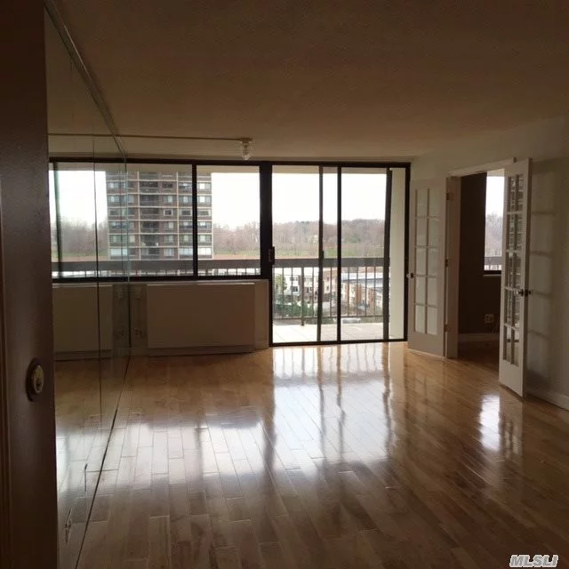 Fully Renovated Condo With Views, Triple Size Terrace. Beautiful Maple Floors, High End Bath Ect....Health Club And Fitness Center, Shops, Express Bus To City.