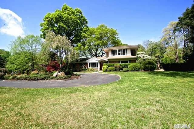 Totally Renovated 5 Bedroom 4 Bath Expanded Ranch Set On Newly Professionally Landscaped 1+ Acres. Bright And Sunny This Open Floor Plan Home Has A New Kitchen And New Baths And Is Situated On Quiet Cul-De-Sac. Hardwood Floors Throughout. Basement Has Br, Bath And Media Room. This Mint Home Is Totally Move In.